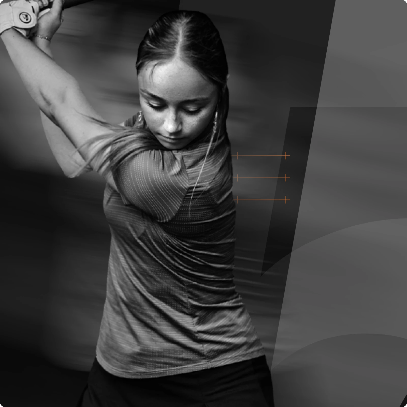 A woman in a dynamic pose, wearing a short-sleeved sports shirt, holds a bat above her head with a focused expression.